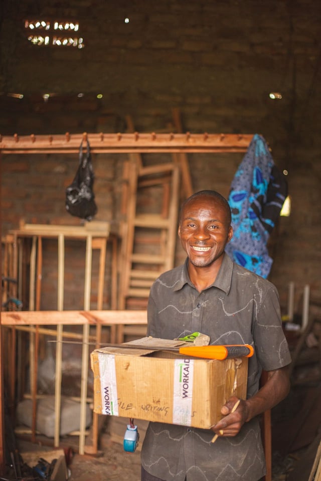 Carpenter at work in a Ugandan workshop
