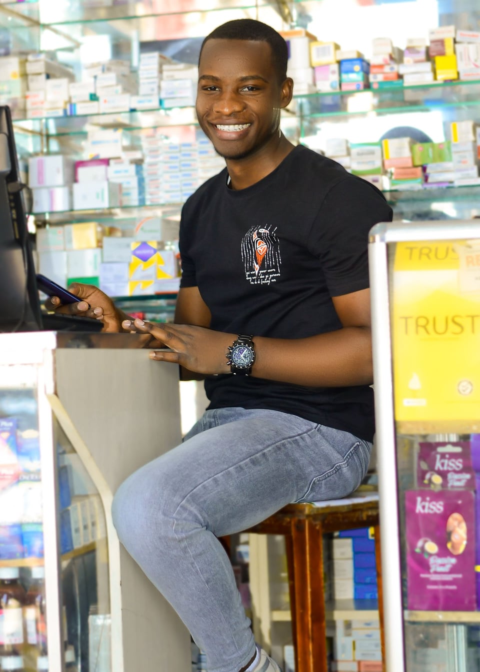 Pharmacist behind a pharmacy counter